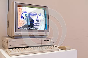 Computer Commodore Amiga 1000 with floppy disk and mouse