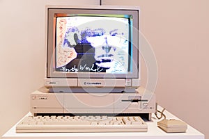 Computer Commodore Amiga 1000 with floppy disk and mouse