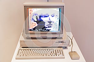 Computer Commodore Amiga 1000 with floppy disk and mouse
