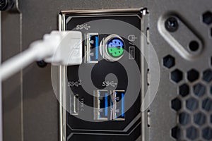 Computer connectors on the back of the system unit close-up,