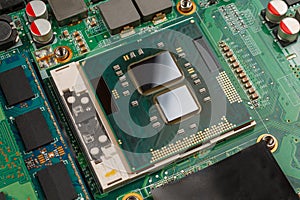 computer CPU close-up on the motherboard background, socket of central process unit, connection of cpu with motherboard, the str