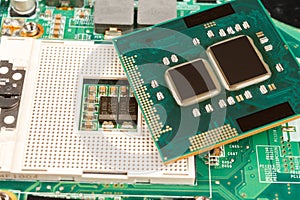 Computer CPU close-up on the motherboard background, socket of central process unit, connection of  cpu with motherboard,  the str