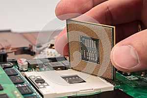 computer CPU close-up on the motherboard background, socket of central process unit, connection of cpu with motherboard, the str