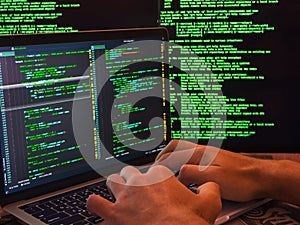 Computer crime concept, hacker breaching server, side view. Anonymus cyber attack