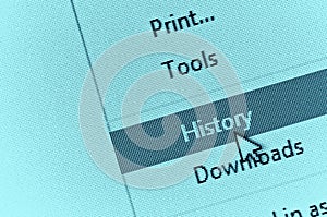 Computer cursor pointing to internet browser history in drop dow