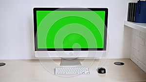 Computer display with a greenscreen