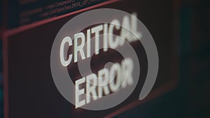 Computer displaying critical error message flashing on screen after cyber crime attack