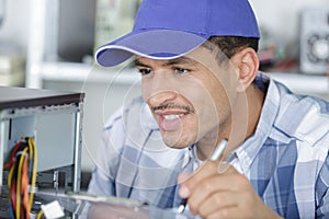 Computer engineer working on broken console