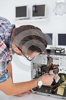 Computer engineer working on broken console