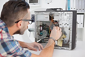 Computer engineer working on broken console