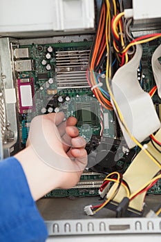 Computer engineer working on broken cpu