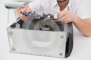 Computer engineer working on broken cpu