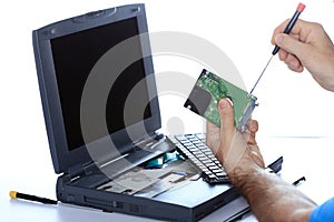 Computer expert is repairing