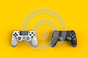 Computer game competition. Gaming concept. White and black joystick isolated on yellow background