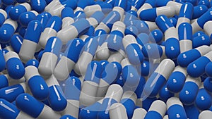 Computer generated 3D blue and white pills being moved