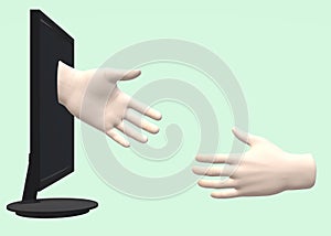 A hand reaching out from a black computer monitor display to another in the real world
