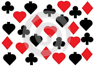 Many duplicates of the four suites of a deck of poker playing cards - spade, heart, diamond and club photo
