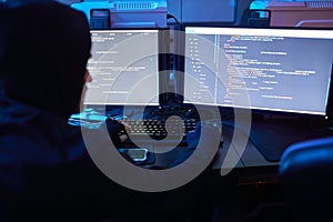 Computer hacker breaking the codes