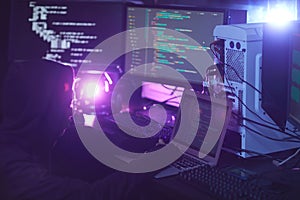Computer Hacker Coding in Dark