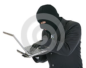 Computer hacker - criminal with the laptop