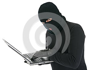 Computer hacker - criminal with the laptop