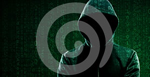 Computer Hacker in Hoodie. Obscured Dark Face. Hacker Attack, Virus Infected Software, Dark Web and Cyber Security