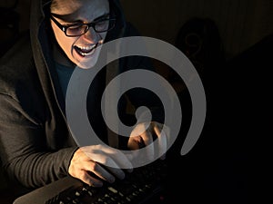 Computer hacker man stealing information with laptop