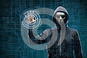 Computer hacker in mask and hoodie over abstract binary background. Obscured dark face. Data thief, internet fraud