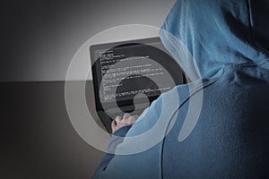 Computer hacker steals data from laptop.