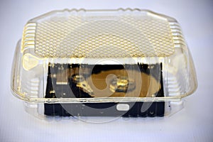 Computer hard disc into transparent plastic container