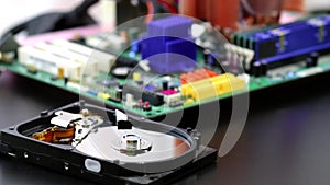 Computer hard disk drive spinning, reading and writing data, stock footage.