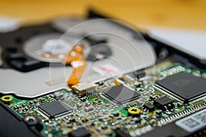 Computer Hard Disk Electronics Circuit, Macro Photo. Hard disk repairing concept, Data saving concept. Blur background with