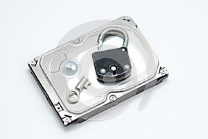 Computer hard disks and open metal padlock concept for encrypted data, cyber security on white background