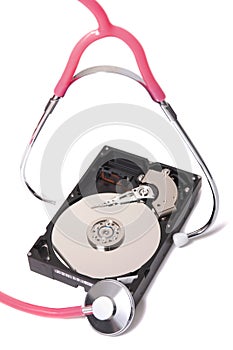 computer hard drive with pink stethoscope