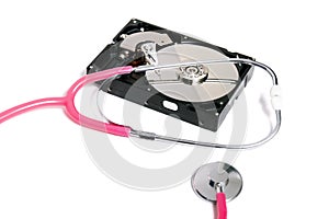 computer hard drive with pink stethoscope