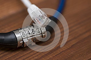 Computer internet cable and lock, internet security concept. Network and data protection concept with padlock