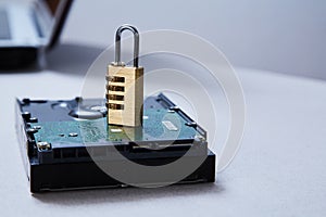 Computer or internet security. Data protection concept: hard drive and lock