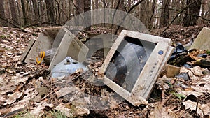 Computer in a junkyard in the forest
