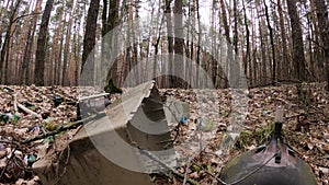 Computer in a junkyard in the forest