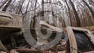 Computer in a junkyard in the forest