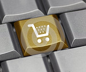 Computer key gold - shopping cart