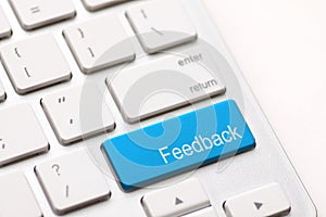 Computer key showing the word Feedback.