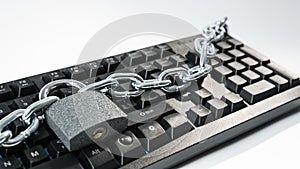 Computer keyboard chain and padlock locked