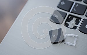 computer keyboard close up photo with broken button