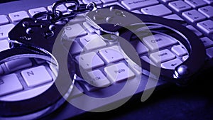 Computer keyboard and handcuffs