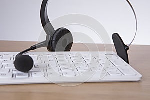 Computer keyboard with headset and mike