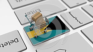 Computer keyboard key with flag of Bahamas and shopping cart with cartons, looping online shopping conceptual 3d