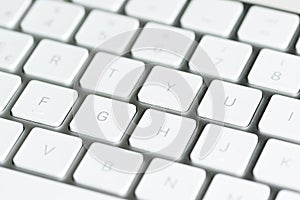 Computer keyboard with keys in the foreground on table