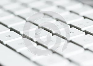 Computer keyboard with keys in the foreground on table