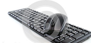 Computer keyboard and mouse isolated on white